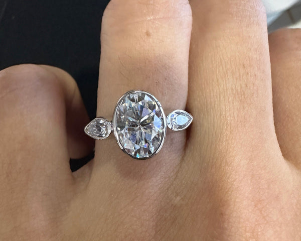 Bezel Set Oval Cut Moissanite Engagement Ring Three Stone Wedding Ring in 18K Gold
