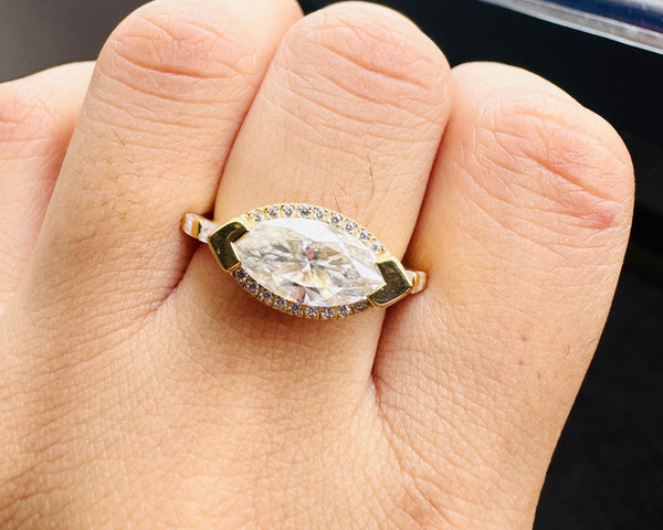 Colorless East West Marquise Cut Moissanite Engagement Ring in 18K Gold