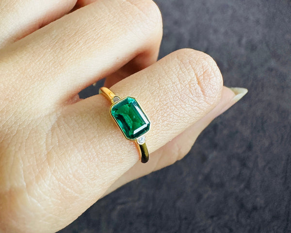 East West Green Emerald Cut CZ Diamond With Two Round Accents Engagement Ring