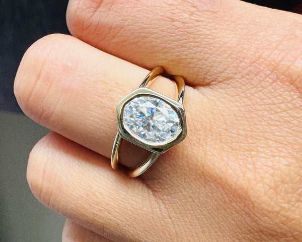 Hexagon Shape Bezel Set Oval Moissanite Solitaire Engagement Ring in 18K Gold