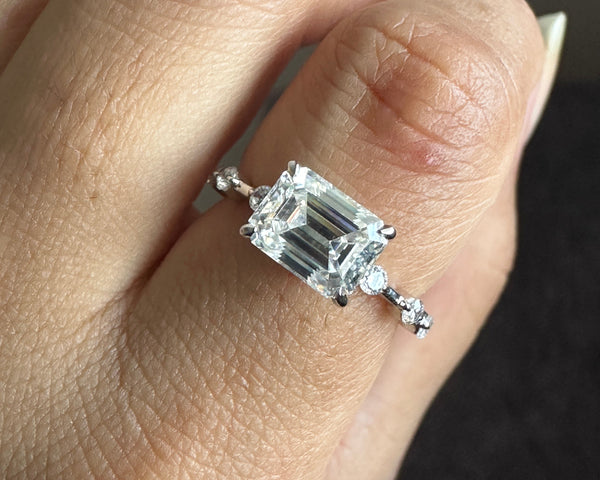 East West Emerald Cut Moissanite Solitaire With Accents Shank Engagement Ring For Women